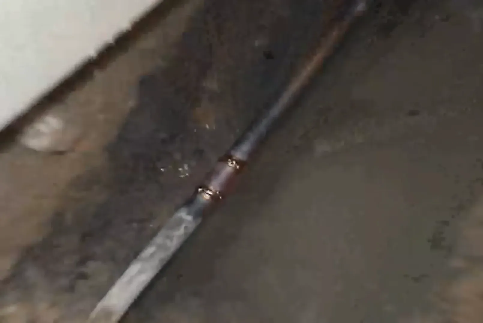 Completed slab leak repair with a new copper line before backfilling