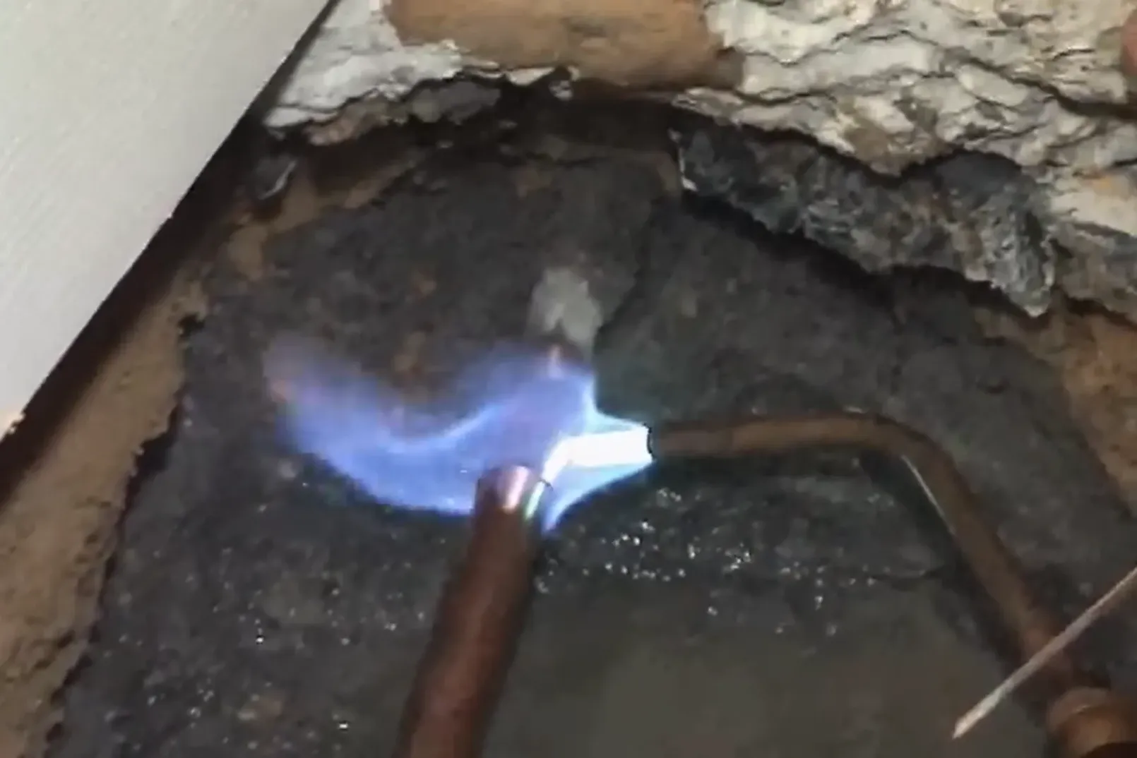 Copper pipe being brazed during a slab leak repair in Prescott